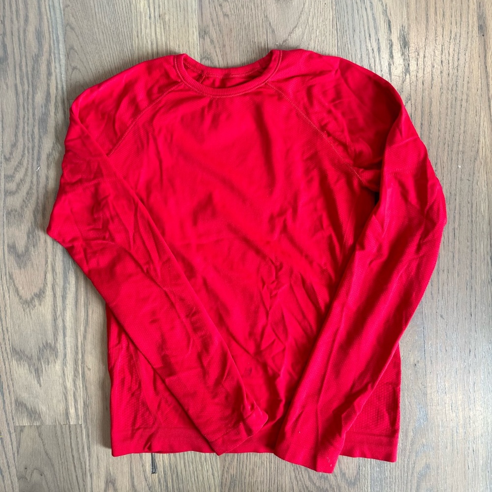 Red stretchy long sleeve athletic shirt